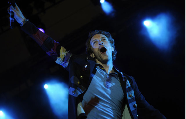 Chris Martin hurt himslelf while surfing